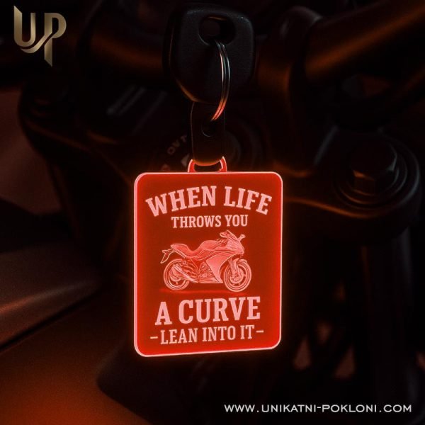 svjetleci privezak kaciga motorista